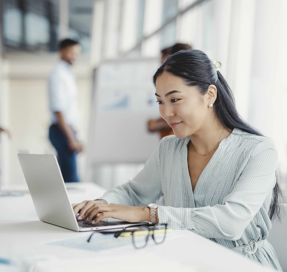 Resident working on her laptop at her office near Anson in Burlingame, California