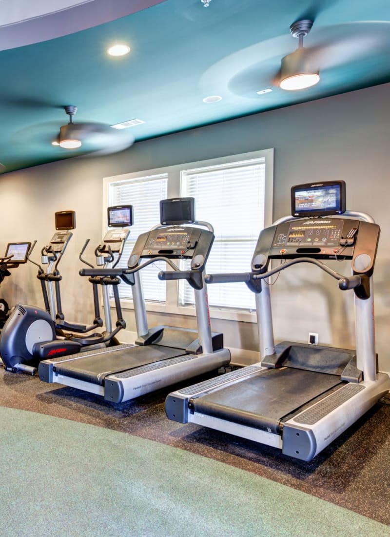 Fitness center featuring treadmills at Marquis at Morrison Plantation in Mooresville, North Carolina