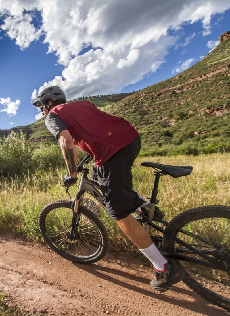 Resident out for a bike ride at Marquis Castle Pines in Castle Pines, Colorado
