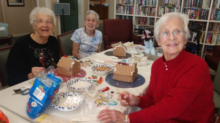 Santa Maria (CA) residents were all smiles while they made gingerbread houses.