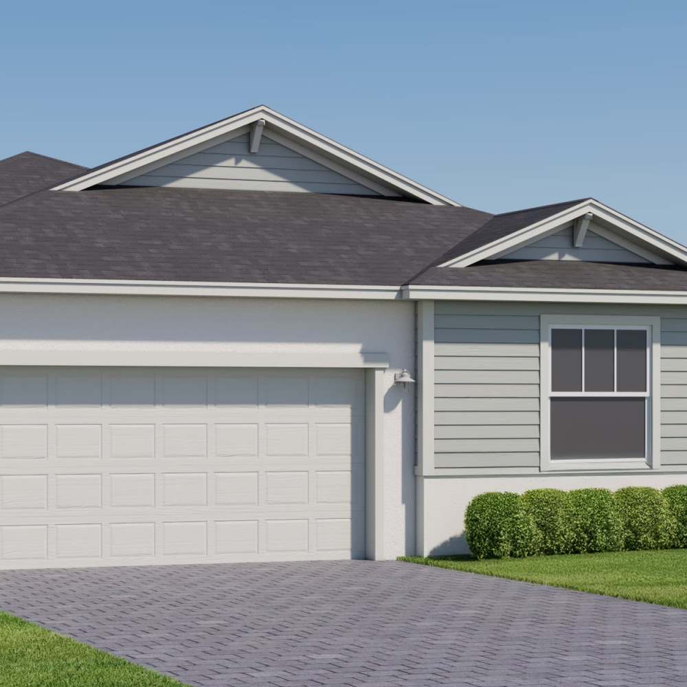 Home with attached garage at Alamar at Fernwood Forest in Indiantown, Florida