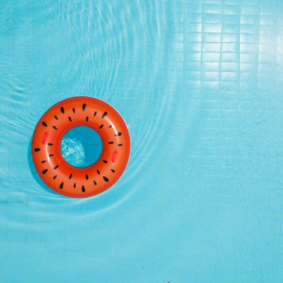 Inner tube floating in pool at Pacific View in Oceanside, California