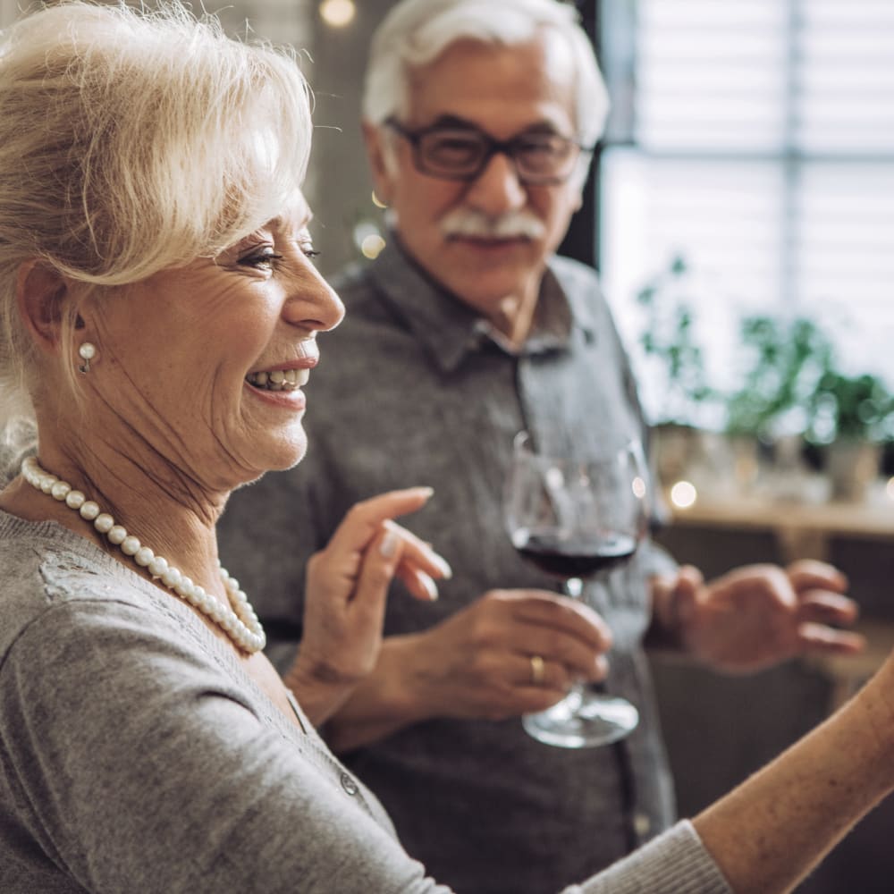 Resident enjoying a glass of wine at Anthology Senior Living in Chicago, Illinois