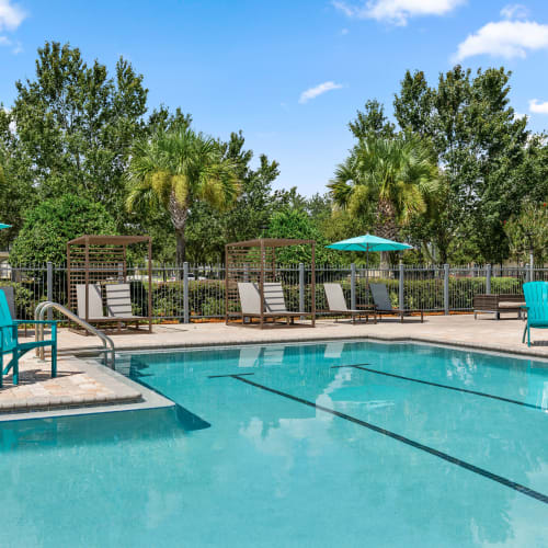 Resort-style swimming pool with underwater lap lanes at Mirador & Stovall at River City in Jacksonville, Florida