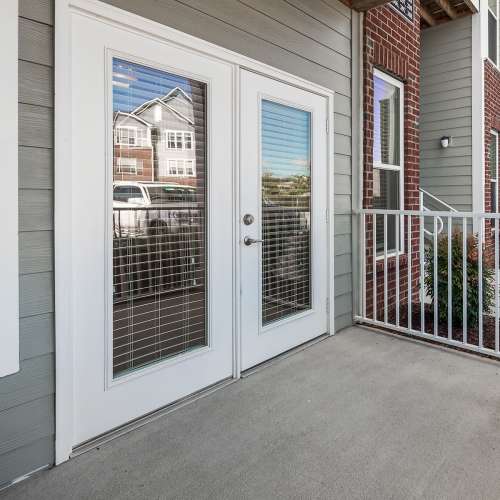 Apartment porch at Groves at Town Center in Fletcher, North Carolina