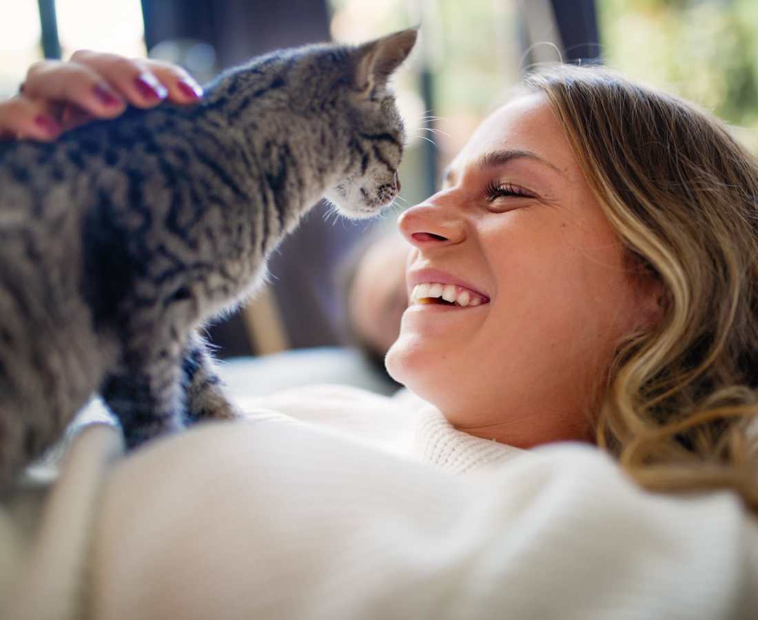 A cute picture of a woman holding her cat on her at Prosper 83 in Sparks, Nevada