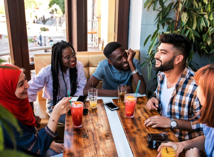 Friends out enjoying some drinks near Macallan at Ross in Dallas, Texas