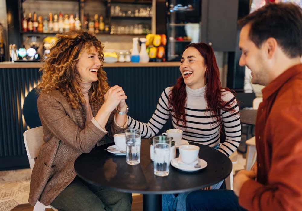 Residents having coffee near The Janson in Del Valle, Texas