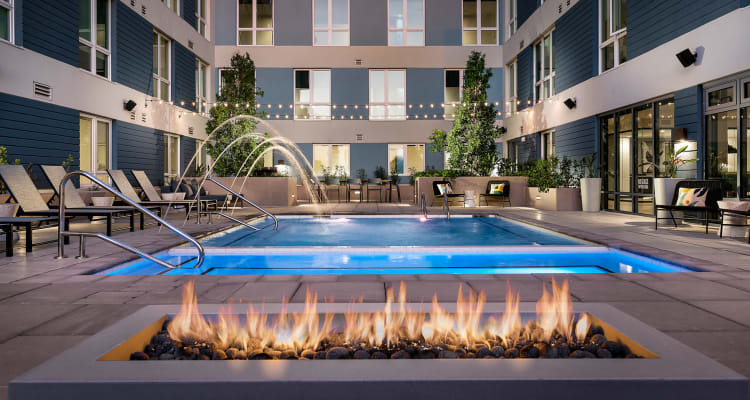 Fireplace and swimming pool at Hudson on Farmer in Tempe, Arizona