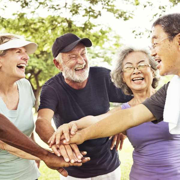 Friends spend the day in a park near Acclaim at Cary Pointe, Cary, North Carolina