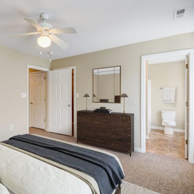 A well-lit bedroom at Midway Manor in Virginia Beach, Virginia