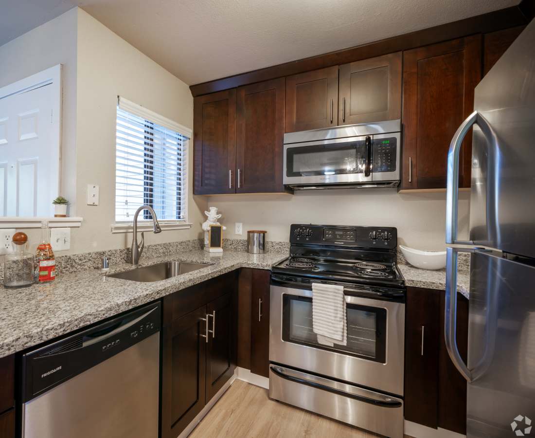 Kitchen with appliances at Hidden Creek in Vacaville, California