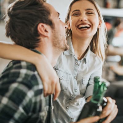 Residents laughing in game room at Santa Rosa in Point Mugu, California