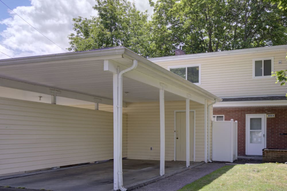 Front exterior view of a home with a carport at Greenwood in Joint Base Lewis McChord, Washington