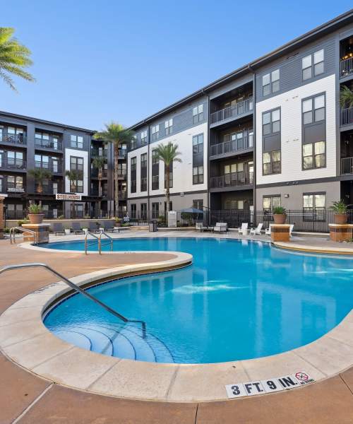 A resort style swimming pool at Steelhouse in Orlando, Florida