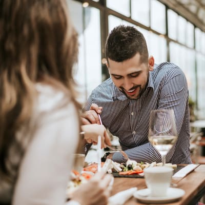 Residents dining at The Club at Harbor Point at Harbor Point Apartments in Mill Valley, California