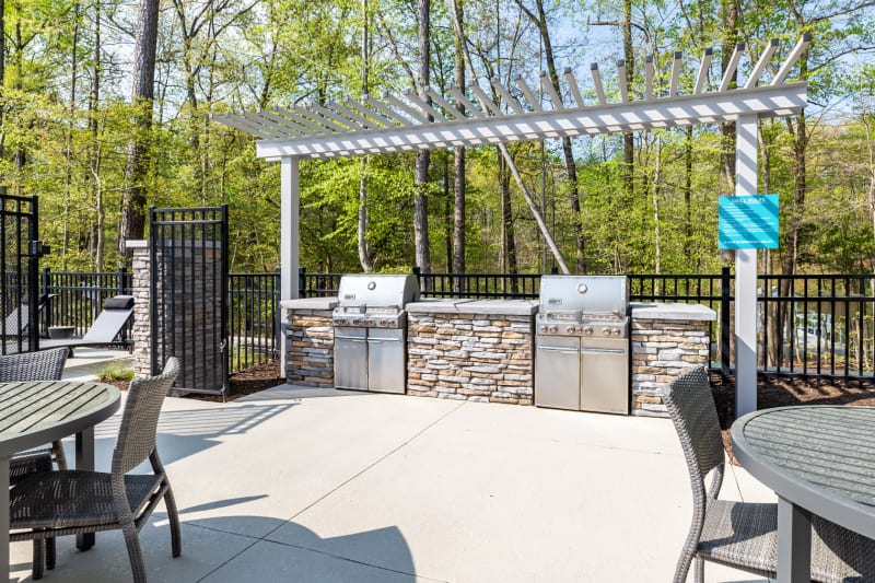 Grilling stations and al fresco dining area at Boulders Lakeside in North Chesterfield, Virginia