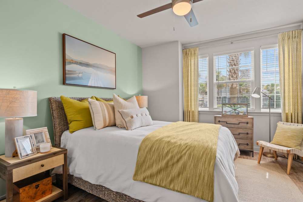 Fully furnished bedroom with window at Pier Park Crossings in Panama City Beach, Florida