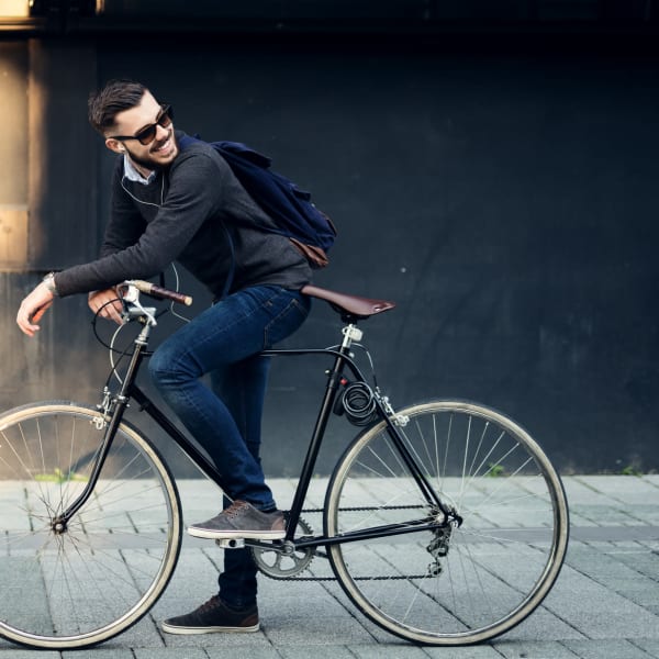 A resident rides his bike to work at Aster, Long Beach, California