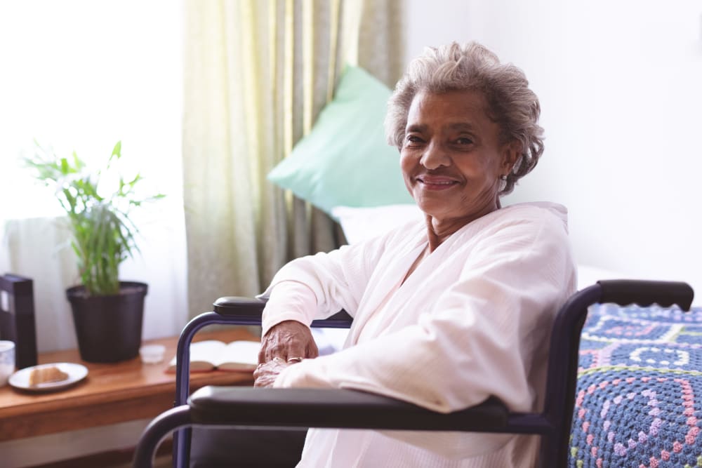 Resident in a wheelchair at Alura By Inspired Living in Rockledge, Florida