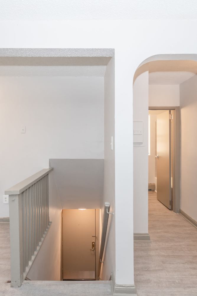 Living room and stairs at Community Meadows Apartments in Camden, New Jersey