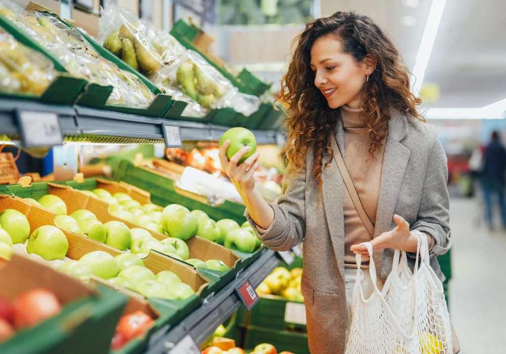 Resident with cart at a supermarket near Seapointe Villas in Costa Mesa, California 