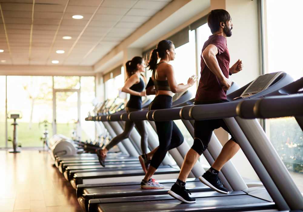 Residents running on treadmills at Gateway Plaza Apartments in Portland, Oregon