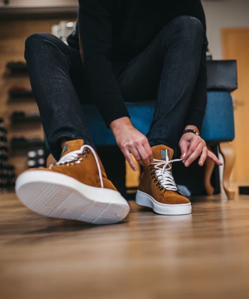 Resident shopping for sneakers near Mercury NoDa in Charlotte, North Carolina