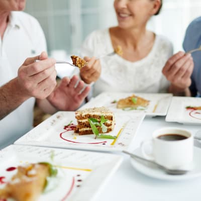 Residents eating a chef-prepared meal at The Sanctuary at Brooklyn Center in Brooklyn Center, Minnesota