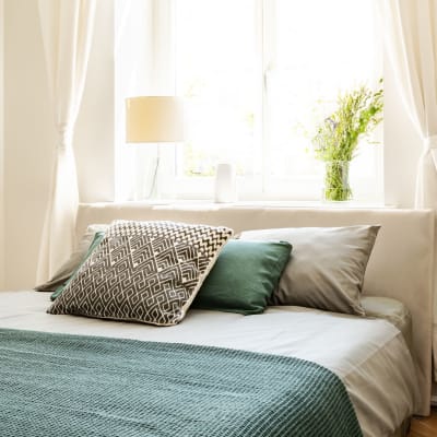 A well-lit bedroom at Home Terrace in San Diego, California