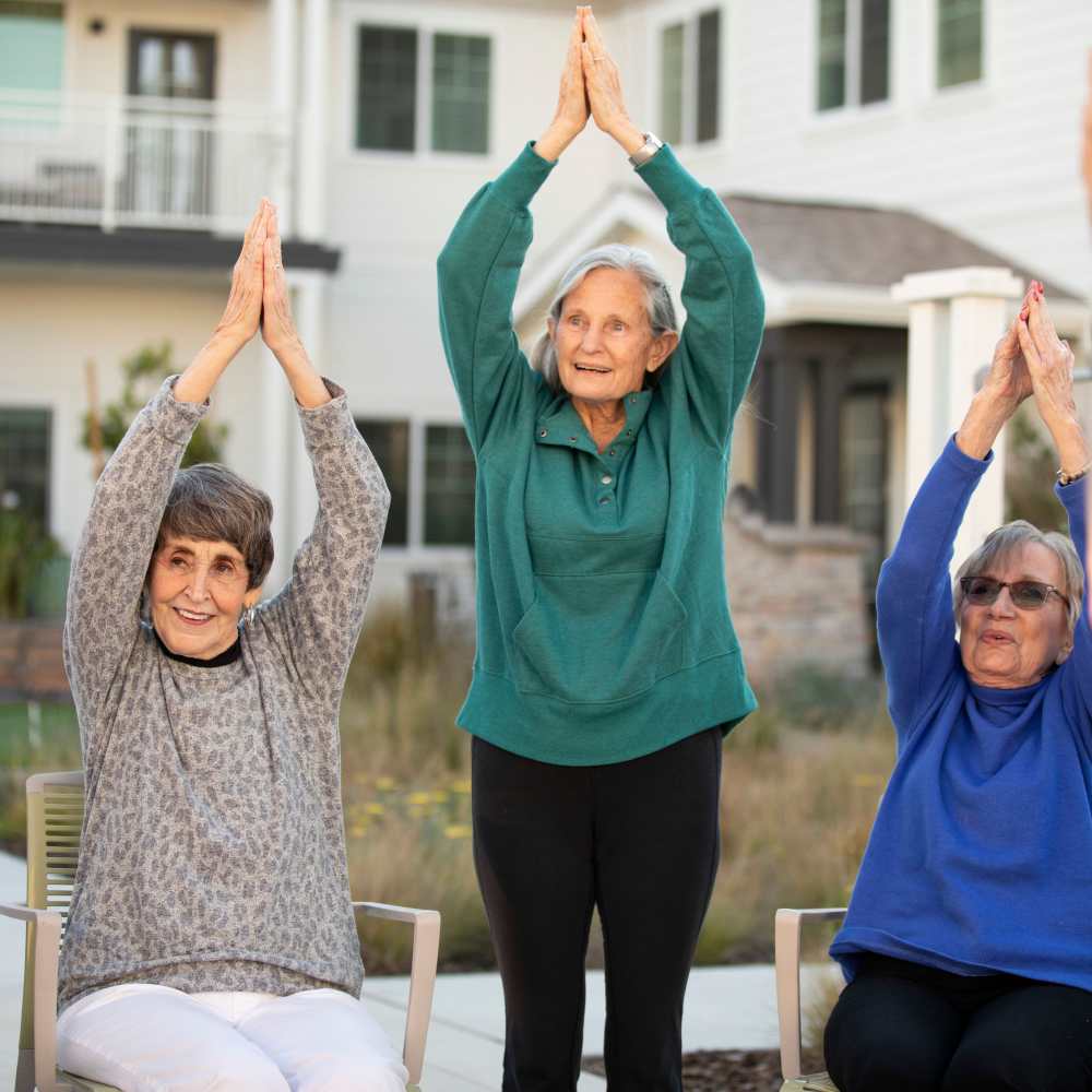 Residents in a yoga class at Clearwater at The Arboretum in Austin, Texas