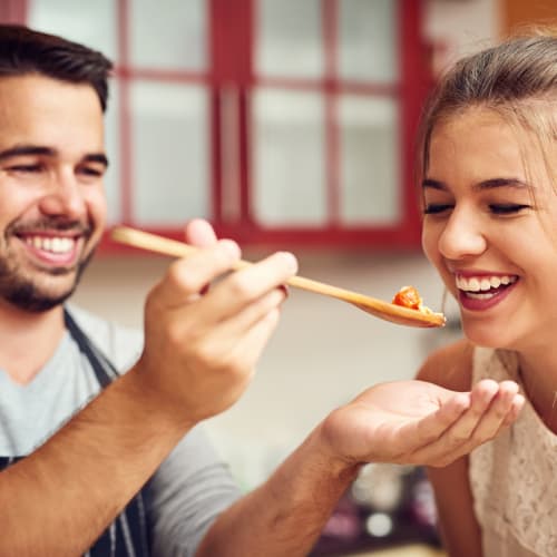 A couple cooking at Town Center in Joint Base Lewis McChord, Washington