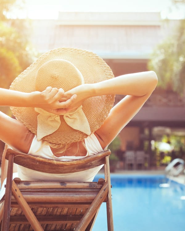Woman by the pool at Preston View in Morrisville, North Carolina