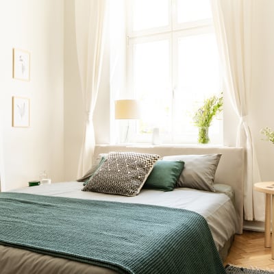 A well-lit bedroom in a home at El Centro New Fund Housing (Officers) in El Centro, California