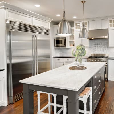 White cabinets in a kitchen at Adobe Flats III in Twentynine Palms, California