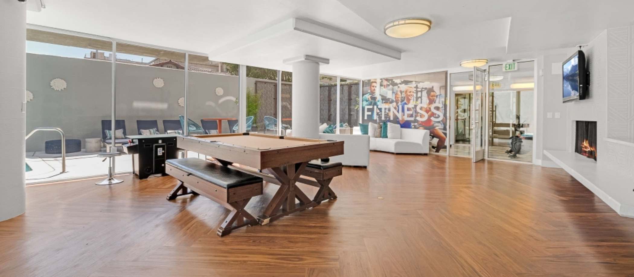 A living room featuring a pool table and a television at 2727 Edison in San Mateo, California.