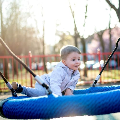 Child playing in the park near Merida in San Antonio, Texas