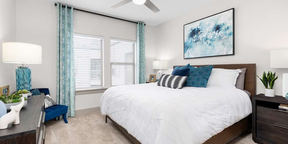 Modern resident clubhouse with sectional seating at SoBA Apartments in Jacksonville, Florida