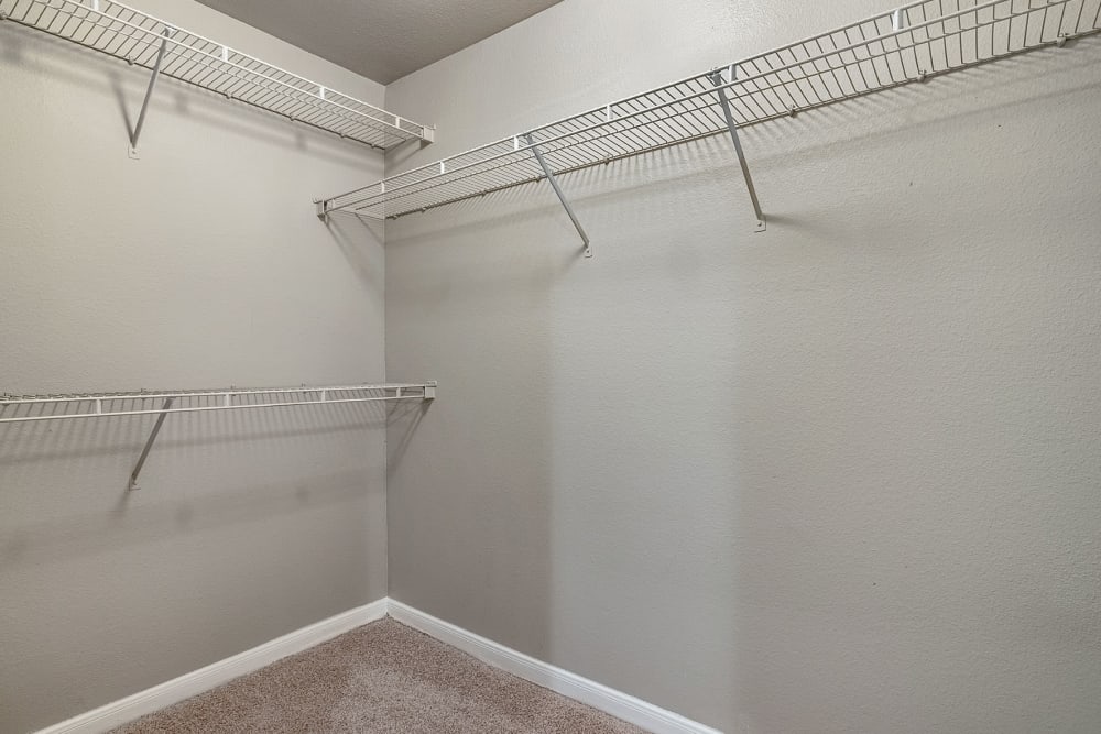Spacious walk-in closet at Marquis at Stonegate in Fort Worth, Texas