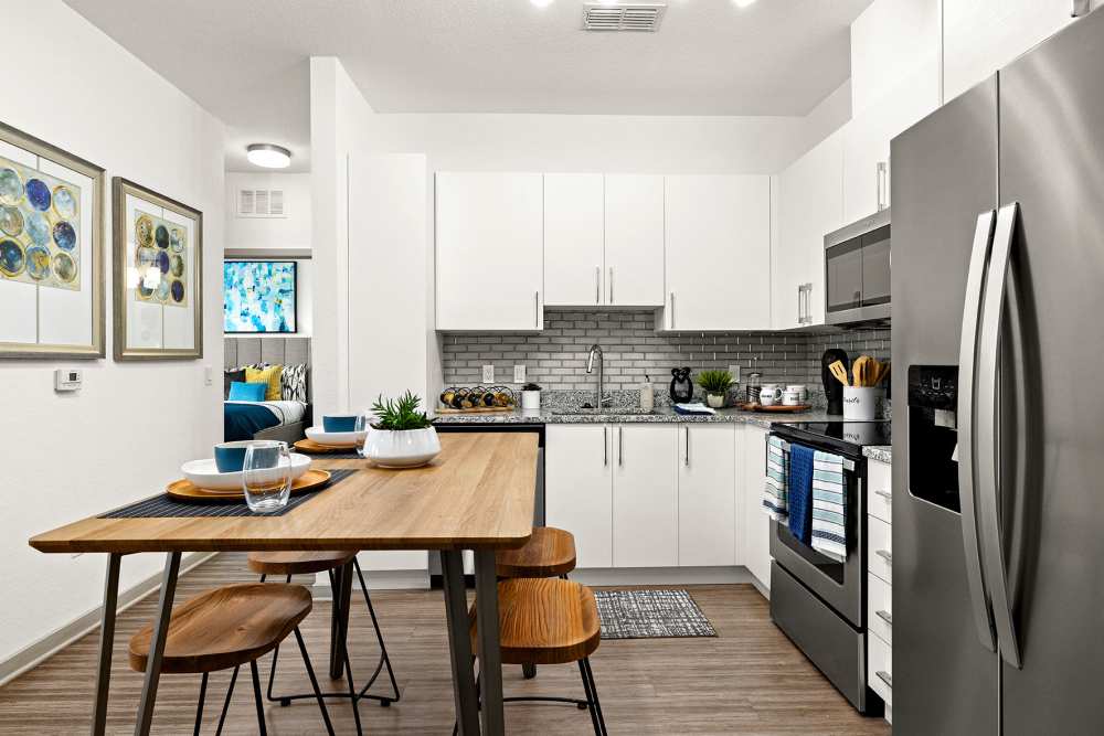 Kitchen with stainless steel appliances at Vue on Lake Monroe in Sanford, Florida