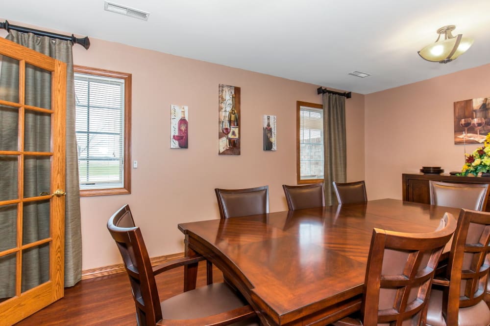 Dining room with wood accents at Brookstone Estates of Tuscola in Tuscola, Illinois