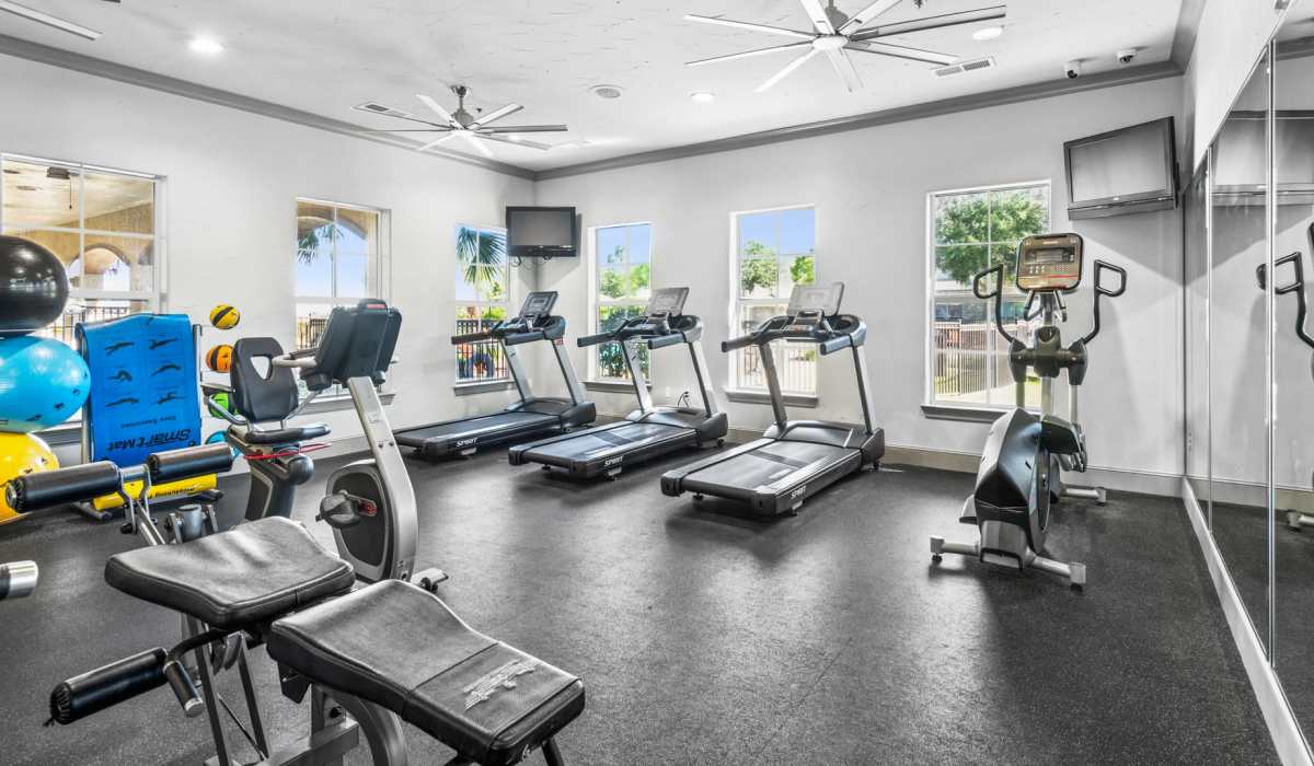 Well equipped fitness center at Park Avenue at Boulder Creek in Houston, Texas