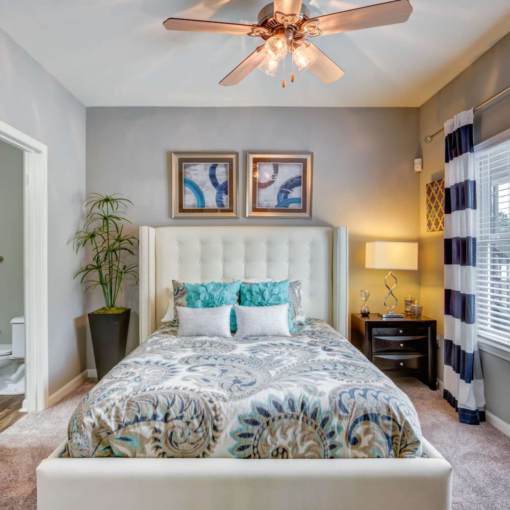 Bedroom with a comfortable bed at Northland Heights in Kansas City, Missouri