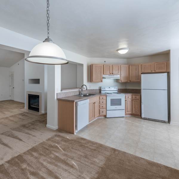 Apartment with white kitchen appliances at Magnolia Chase, Virginia Beach, Virginia